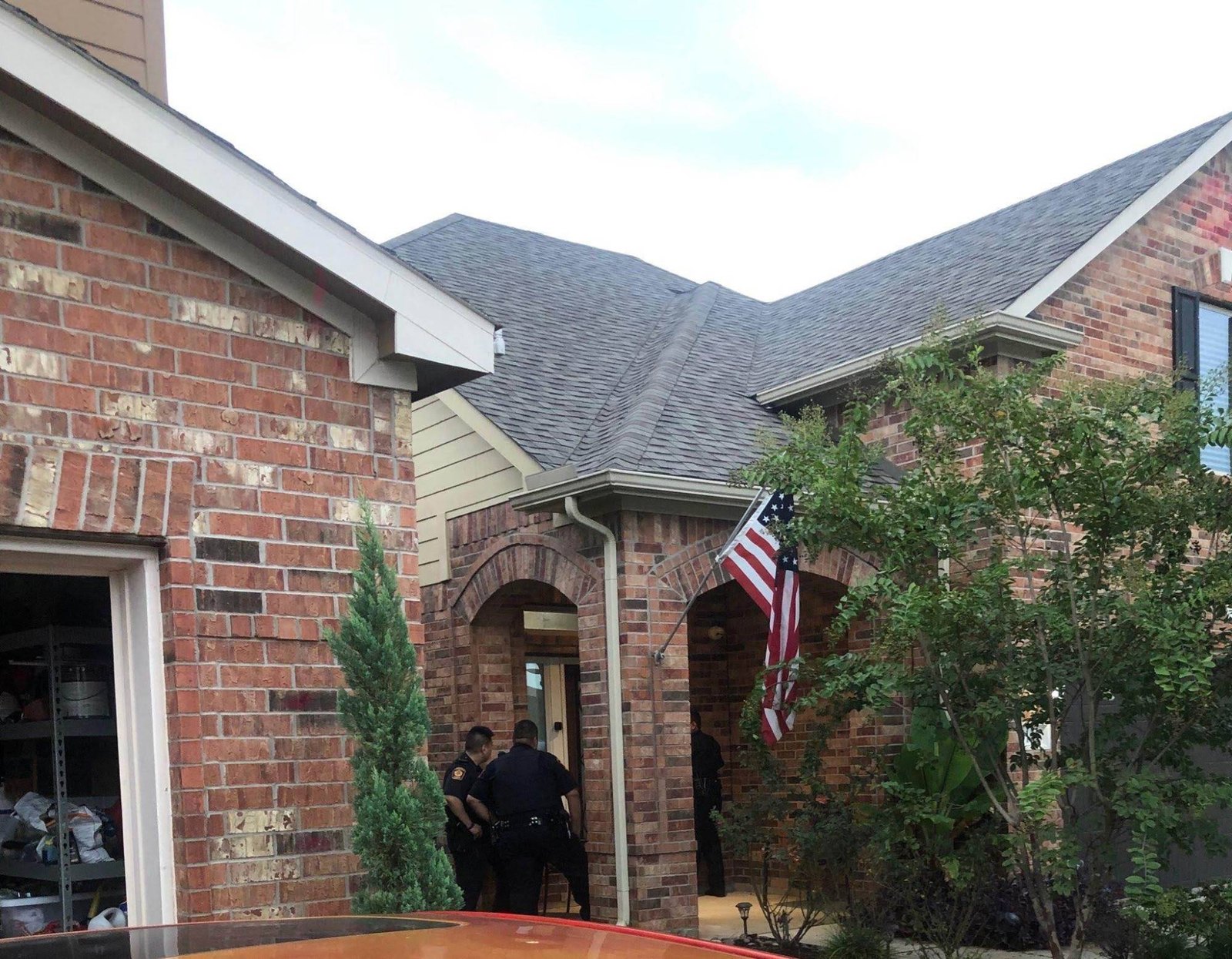 The day of the eviction, 2019 · police at the front door of the house he had bought the year before; one hour to leave. Photograph by a neighbour.