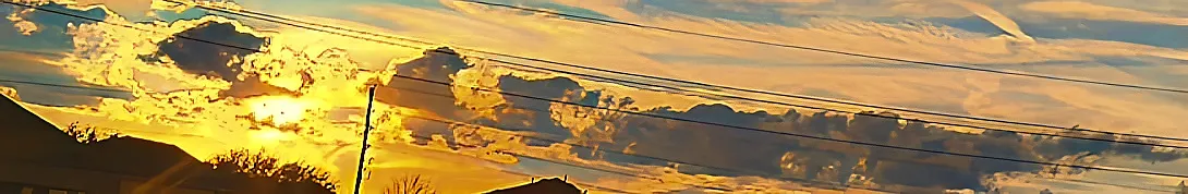 A golden sky ablaze with divine light — the throne of God as described in Revelation 4